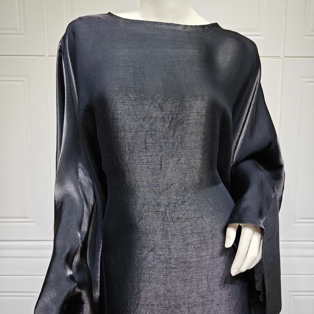 Robe longue femme élégante en tissu soyeux idéale pour les vêtements de vente tous