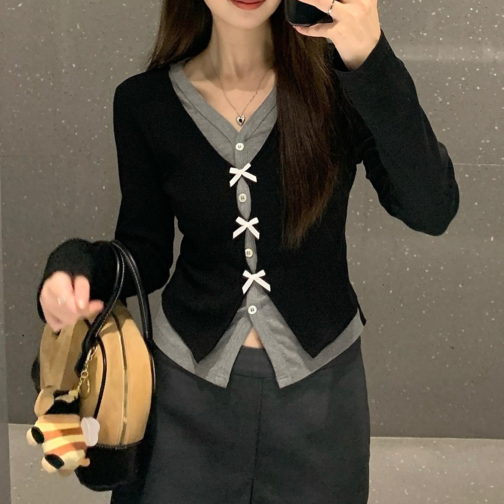 Sofisticado top negro para mujer con cuello en V con elegantes mangas largas y lazo - Imagen 17 de 32