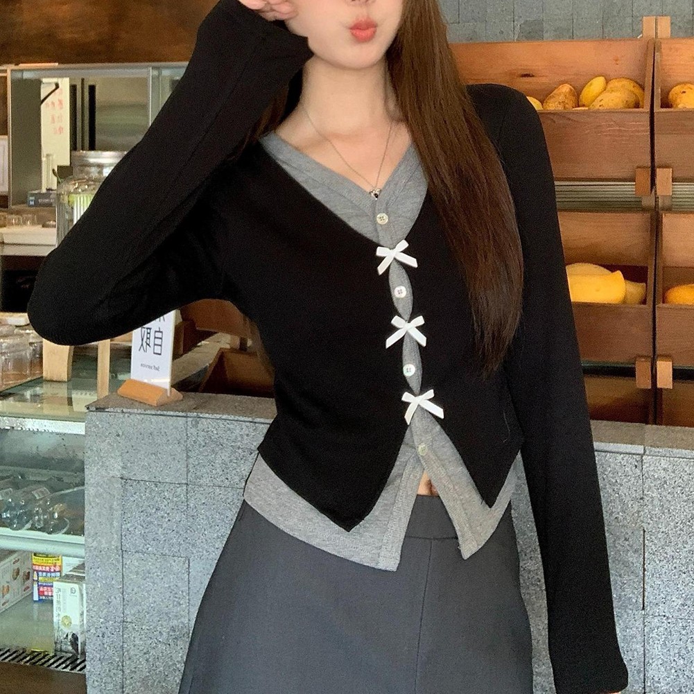 Sofisticado top negro para mujer con cuello en V con elegantes mangas largas y lazo - Imagen 14 de 32