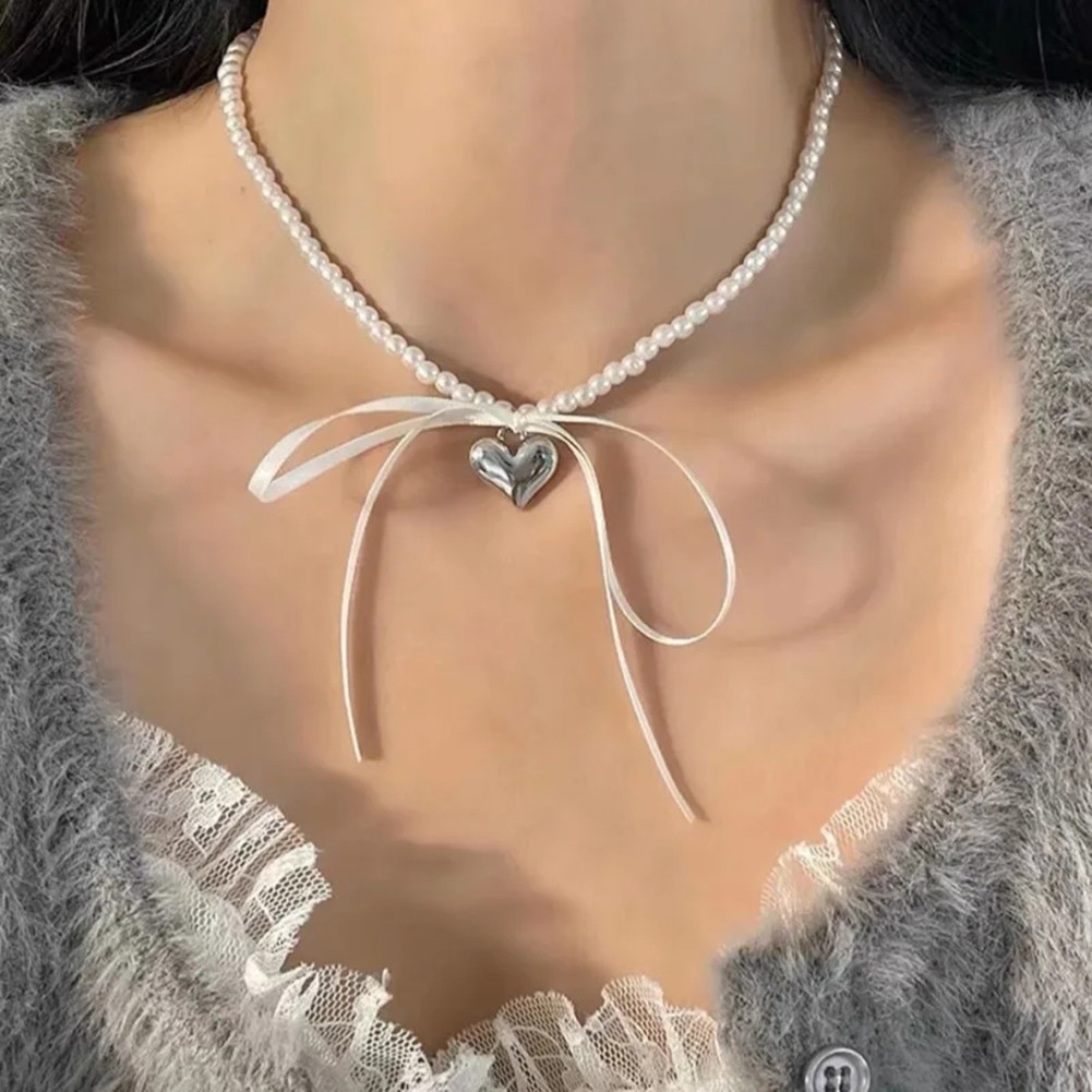 Stylish Solid Metal Necklace Featuring a Love Ribbon Bow Knot and Pearl Design - Picture 13 of 14