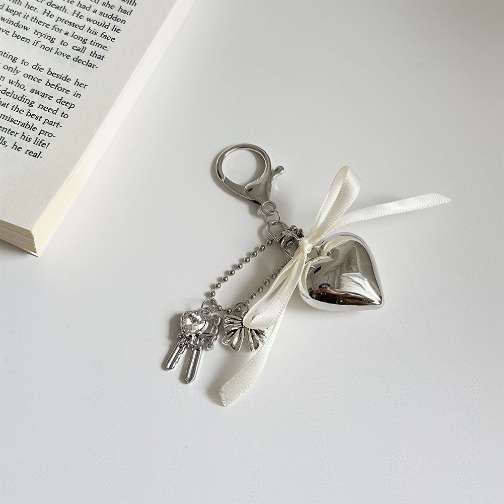 Whimsical Heart Shaped Keychain with Bow Stylish Accessory for Keys and Bags - Picture 7 of 8