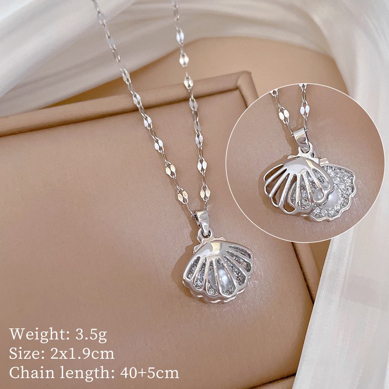 Leichte und elegante Muschel Perlenkette mit Zirkon und Diamant Akzenten - Picture 14 of 14