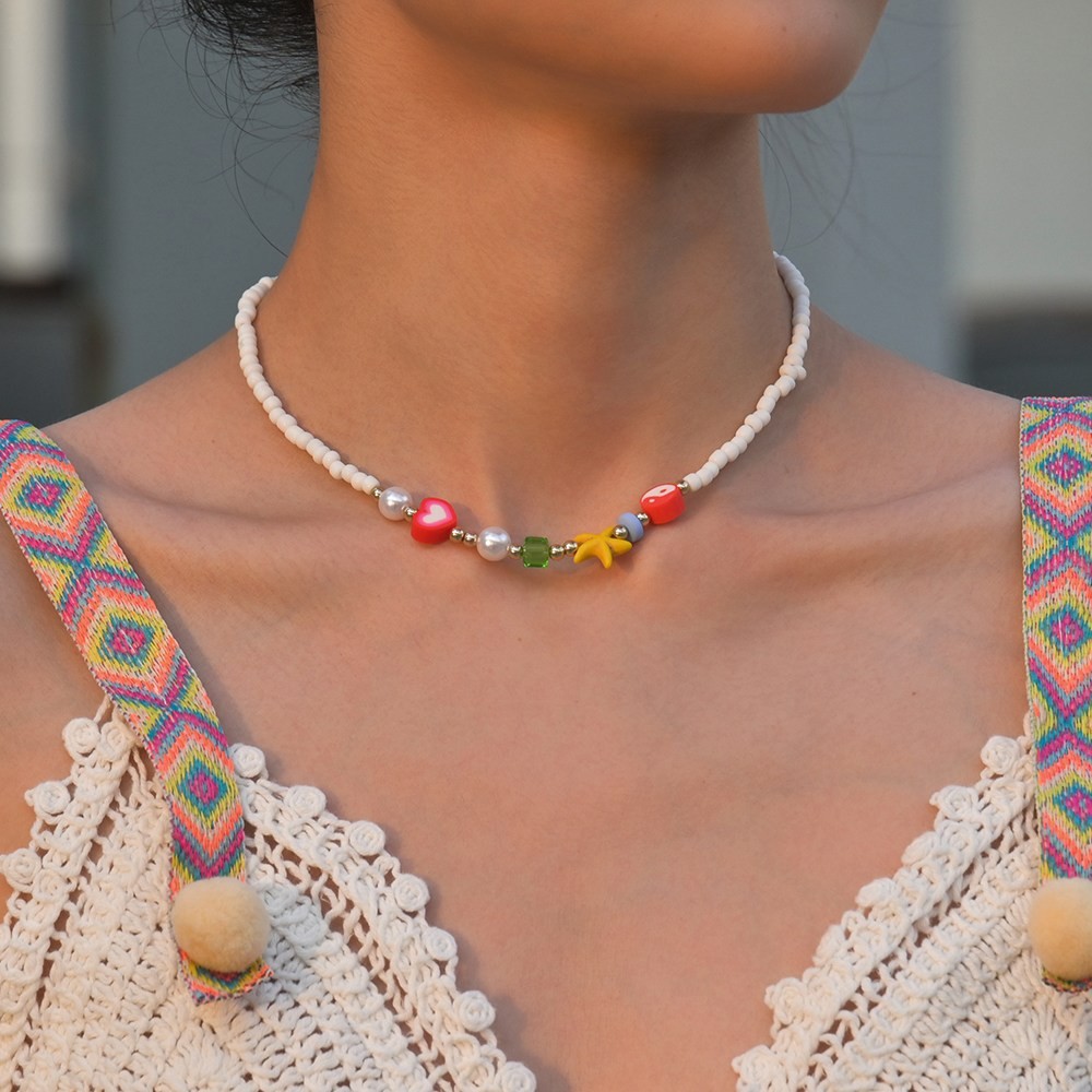 Colorful Bohemian Necklace Featuring Turquoise Starfish and Rice Beads - Picture 23 of 36