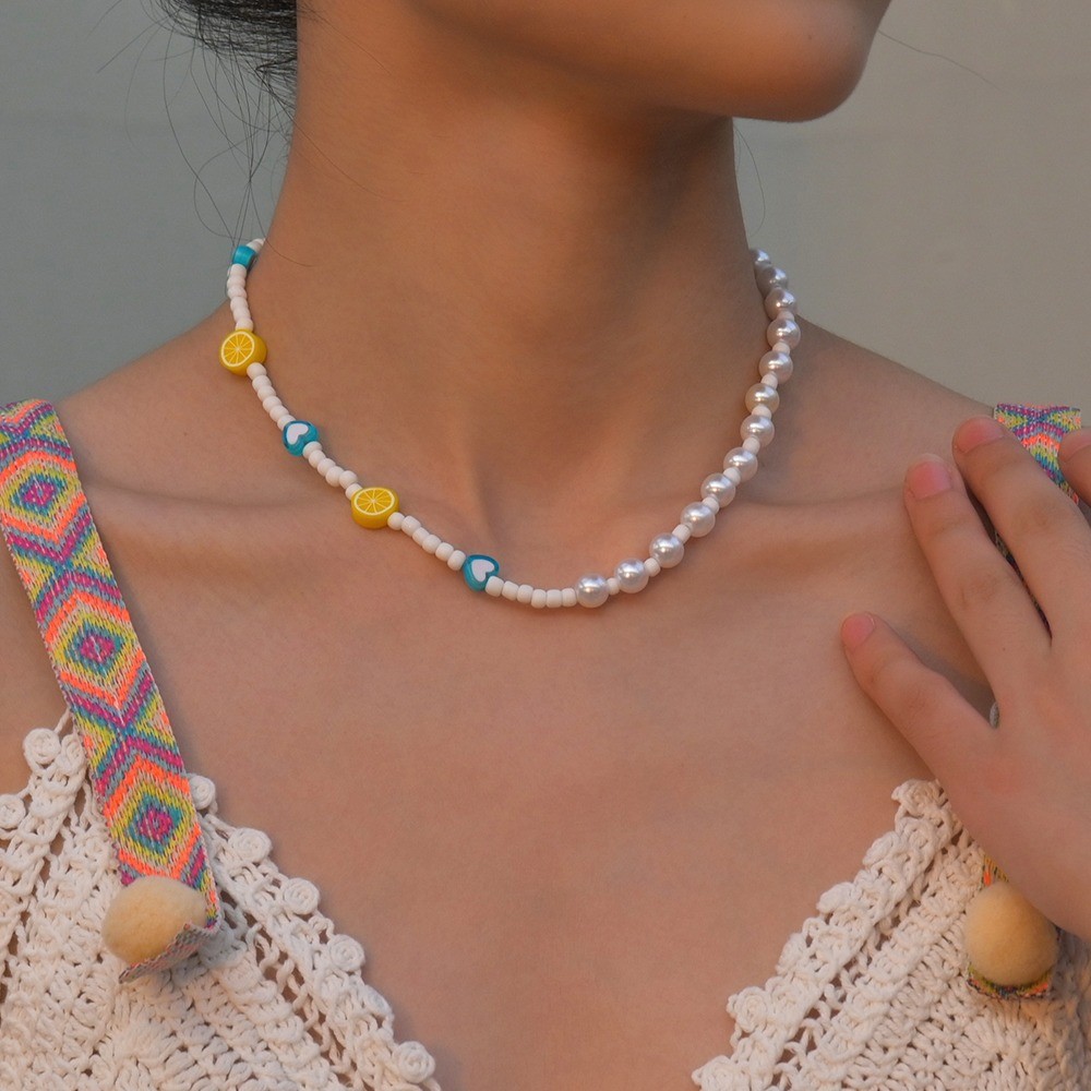 Colorful Bohemian Necklace Featuring Turquoise Starfish and Rice Beads - Picture 20 of 36